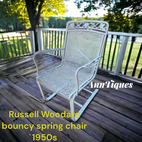 Furniture  Russel Woodard spring bouncy chair